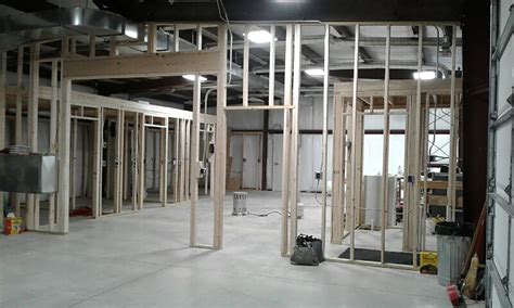 wooden frame inside metal building